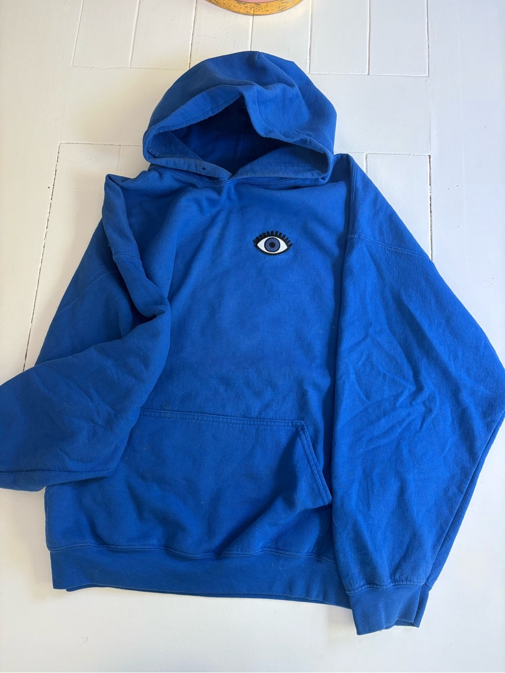 Blue Hooded Sweatshirt with Eye Motif